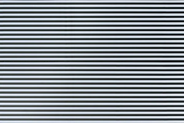 Corrugated metal sheet. New and Modern silver grey background pattern. — Stock Photo, Image