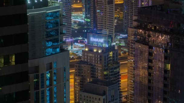 Rascacielos nocturnos de Dubái desde arriba lapso de tiempo. Prepárate. — Vídeo de stock