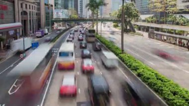 Hong Kong trafik gökdelenler sokak ile panorama hızlandırılmış Çin. yukarı kaydır
