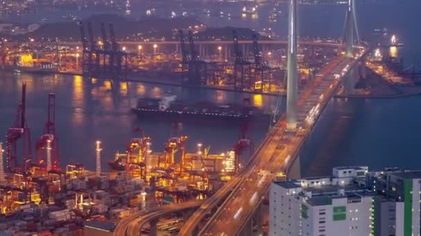 Hong Kong skyview of the port with traffic time-lapse. pan up — Stock Video