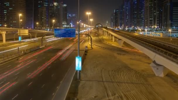 Dubai night traffic time-lapse UAE. zoom out — стокове відео