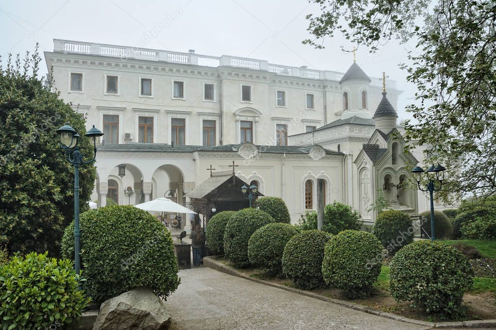 Romanov's Church at Livadia Palace Framed by Trees in a Foggy Da
