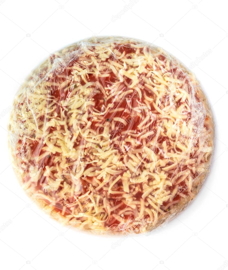 frozen pizza in plastic wrap on white background