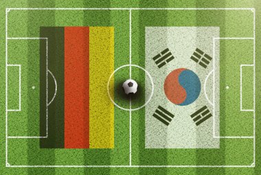yeşil futbol sahası üstten görünüm ile Almanya ve Güney Kore bayrakları