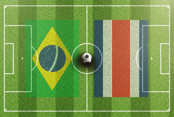 Vista superior do campo de futebol verde com bandeiras do Brasil e Costa Rica — Fotografia de Stock