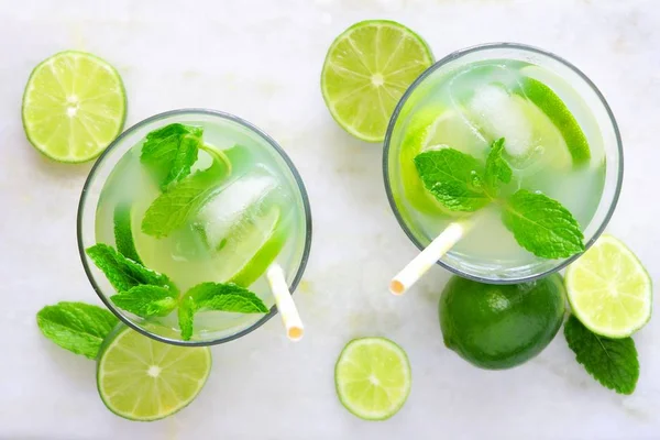 Two Glasses Summer Limeade Mint Top View White Marble Background — Stock Photo, Image