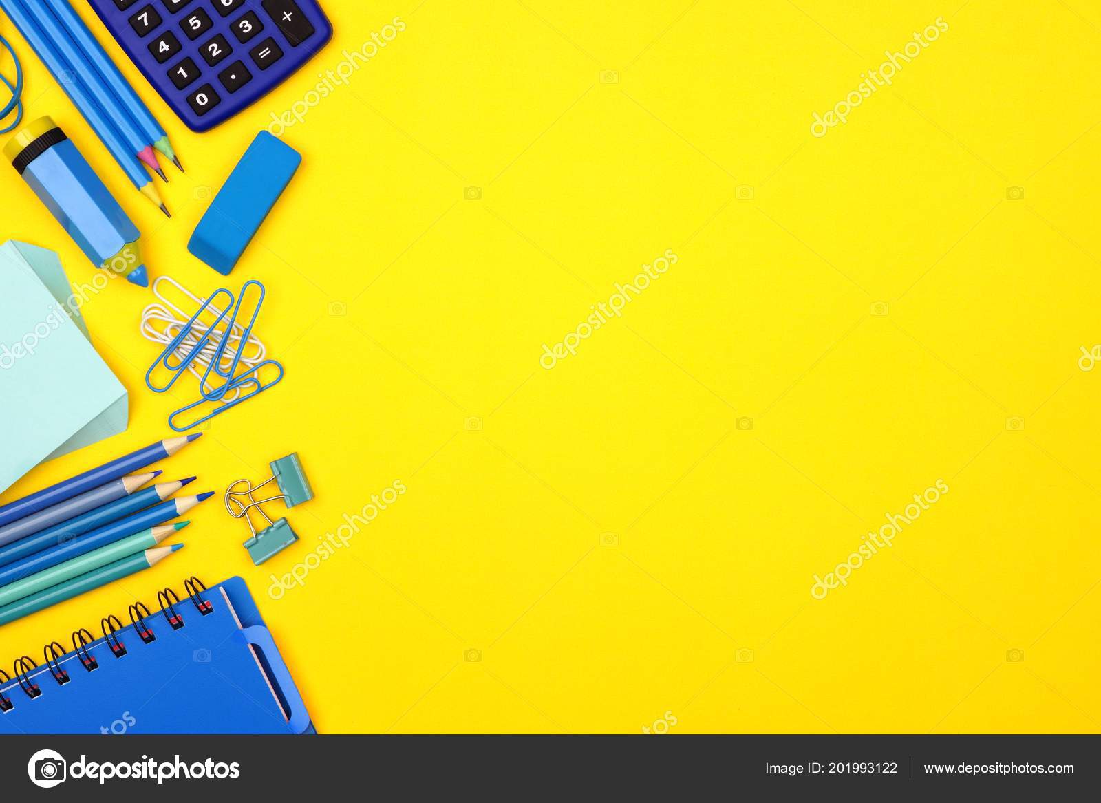 blue school supplies side border bright yellow paper background