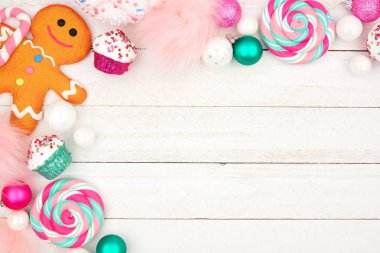Pastel Noel tatlılar Tema köşe kenarlığı parlak beyaz ahşap zemin üzerinde