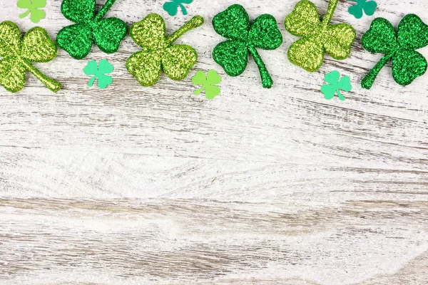 Patricks Day Top Border Shiny Shamrocks Rustic White Wood Background — Stock Photo, Image