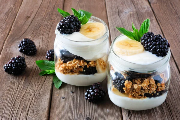 Healthy Blackberry Banana Yogurt Parfaits Mason Jars Rustic Wood Background — Stock Photo, Image