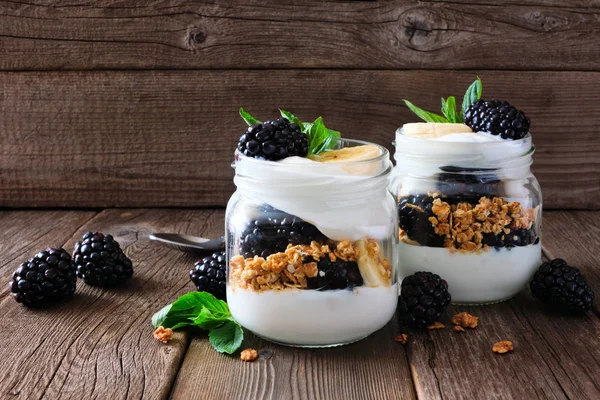 Healthy Blackberry Banana Yogurt Parfaits Mason Jars Dark Wood Background — Stock Photo, Image
