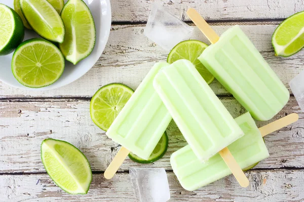 Healthy Lime Yogurt Ice Pops Top View Table Scene Rustic — 스톡 사진