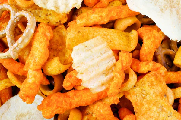 Close Mixed Salty Snacks Including Cheese Treats Potato Chips Pretzels — Stock Photo, Image