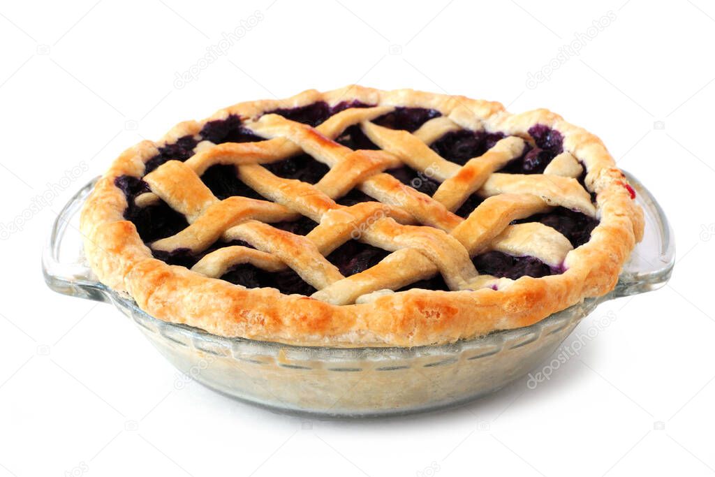 Homemade blueberry pie with lattice pastry isolated on a white background. Side view.