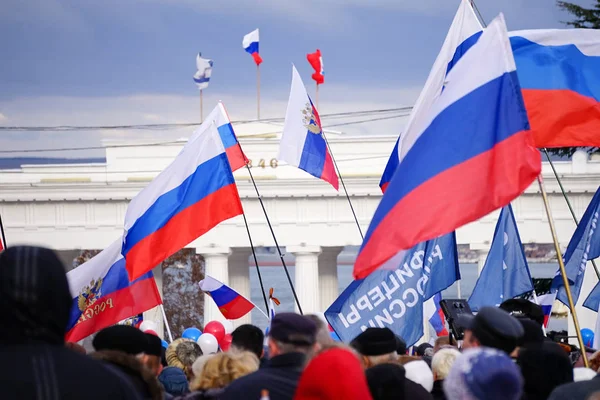 Russian Patriotic holiday with flags and concerts in the city square.
