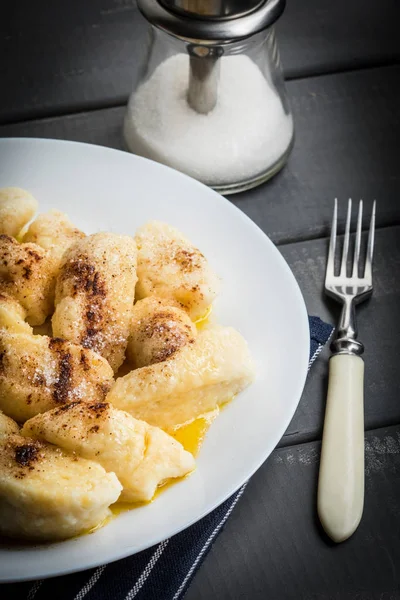 Lazy dumplings with cinnamon and sugar.