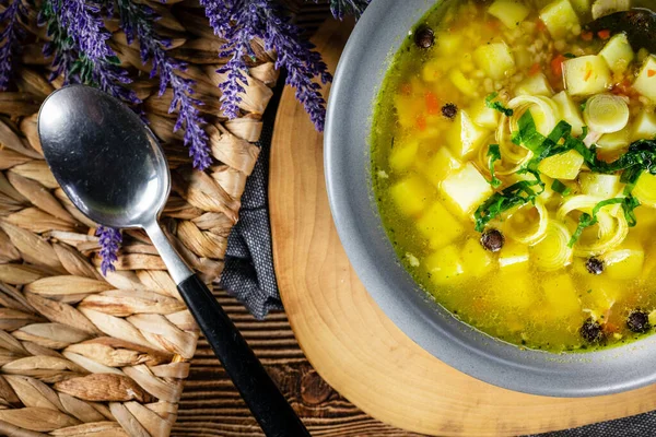 Polish barley soup with vegetables and chicken - krupnik.