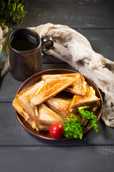 Grilled cheese sandwich on plate. Shallow depth of field.