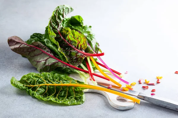 Various Different Coloured Chard Leaves Gray Surface — Stock Photo, Image
