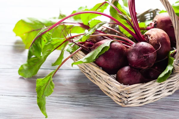 Fresh Organic Beetroot Green Leaves Basket Wnite Wooden Table — Stock Photo, Image