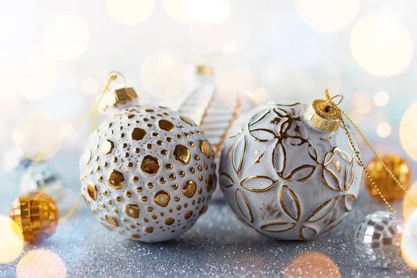 Christmas background with silver and gold vintage baubles