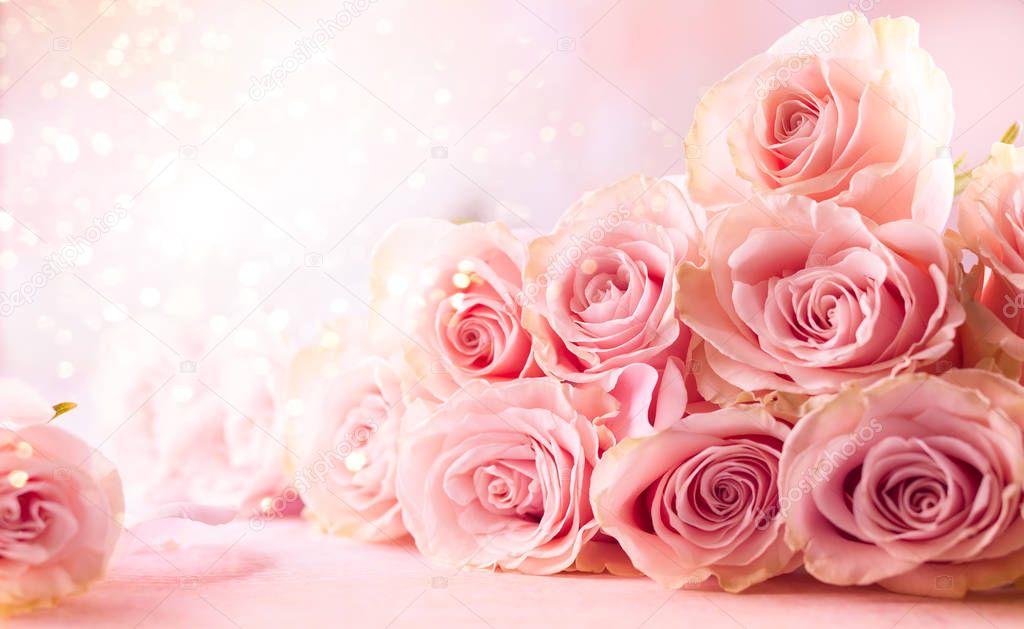 Festive still life with pink roses. Flower composition with roses. Soft focus.