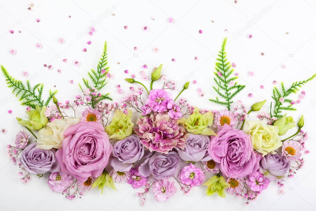 Beautiful  flowers on white  background. Festive floral concept with clean space for text. Top view.