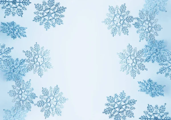 Festive winter background with decorative snowflakes in flying. — Stock Photo, Image