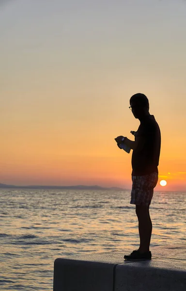 Silueta en la puesta de sol de Zadar. Croacia. Europa — Foto de Stock