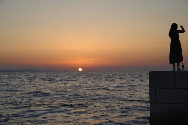 Silueta en la puesta de sol de Zadar. Croacia. Europa —  Fotos de Stock