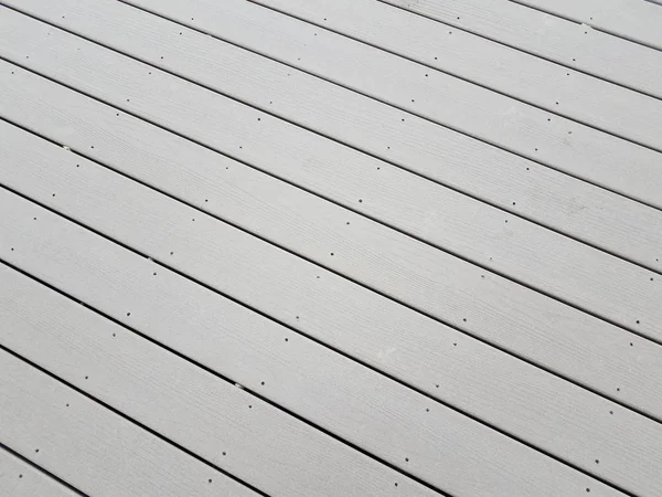 Grey wood boards with nails on deck — Stock Photo, Image