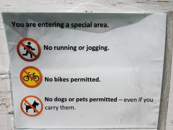 You are entering a special area sign no running or jogging — Stock Photo, Image