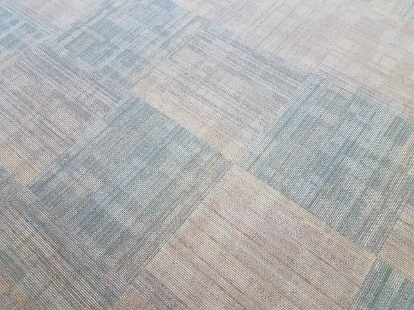 Modrý a šedý koberec nebo koberec na zemi — Stock fotografie