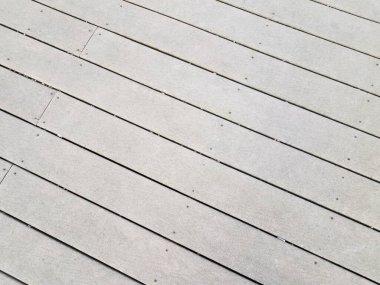 gri yapay tahta döşeme tahtaları ya da yerdeki kereste