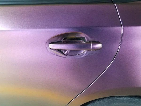 Worn Damaged Purple Wrap Automobile Door Handle — Stock Photo, Image