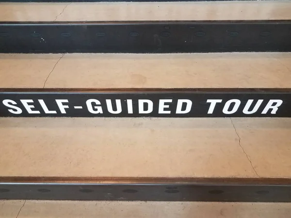 White Self Guided Tour Sign Black Grey Cement Stairs Steps — Stock Photo, Image