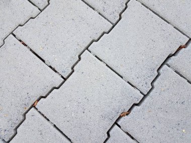 Düzensiz şekilli gri çimento döşeme zeminde