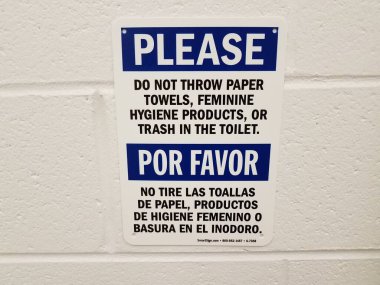 Tuvalet tabelasına kağıt havlu atmayın lütfen. İngilizce ve İspanyolca. Tuvalet veya tuvalet duvarına.