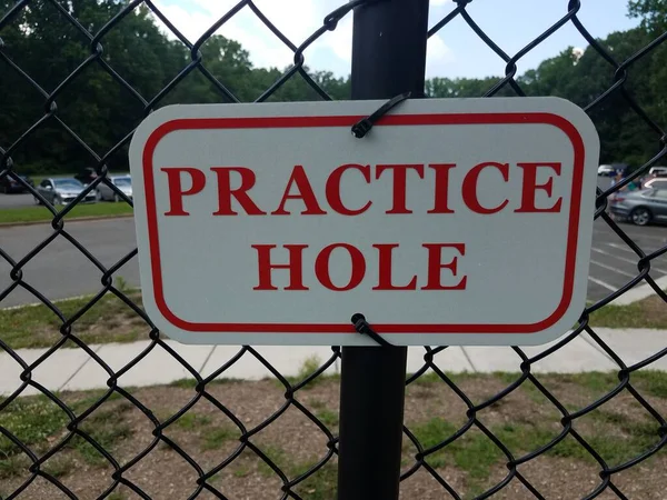Red White Practice Hole Sign Metal Chain Link Fence — Stock Photo, Image