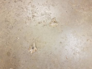 pürüzlü bir doku ve yıpranmış gri beton zemin