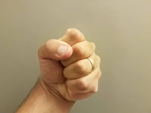 Man Hand Closed Fist Gray Background — Stock Photo, Image