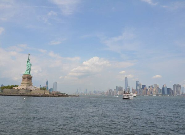 Statue of liberty monument and river water in New York city