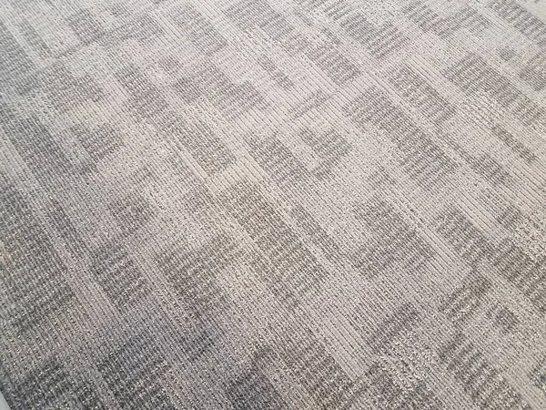 地面や床にグレーのカーペットやラグの繊維 — ストック写真