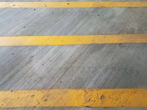 Grey Rough Textured Cement Yellow Lines — Stock Photo, Image