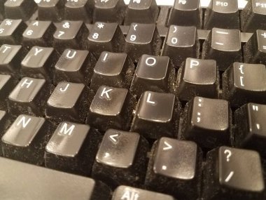 kirli siyah bilgisayar klavye harfleri saç ve toz ile