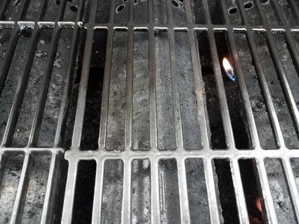 Beskidt Eller Beskidt Sort Grill Grill Metal Barer - Stock-foto