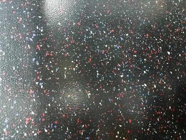 赤白青の斑点のある黒い床 — ストック写真