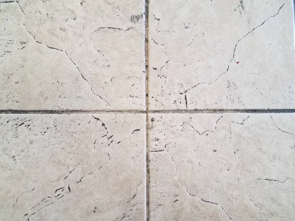 Dirty or grimy white floor tiles or ground — Stock Photo, Image