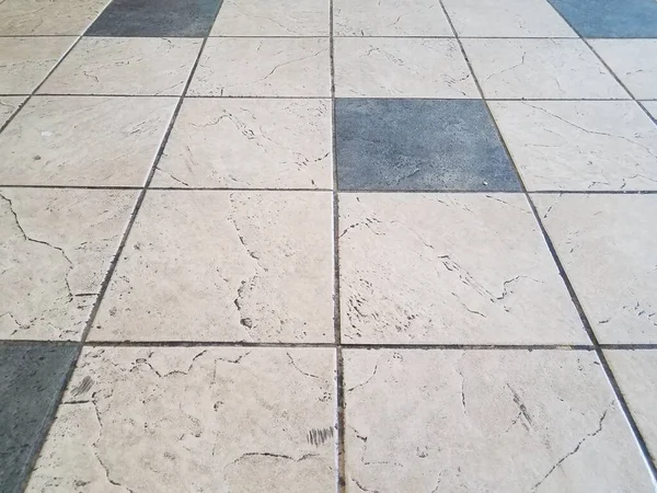 Dirty white and black floor tiles or ground — Stock Photo, Image