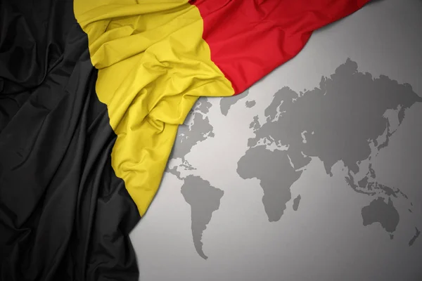 Agitant Drapeau National Coloré Belgique Sur Fond Carte Monde Gris — Photo